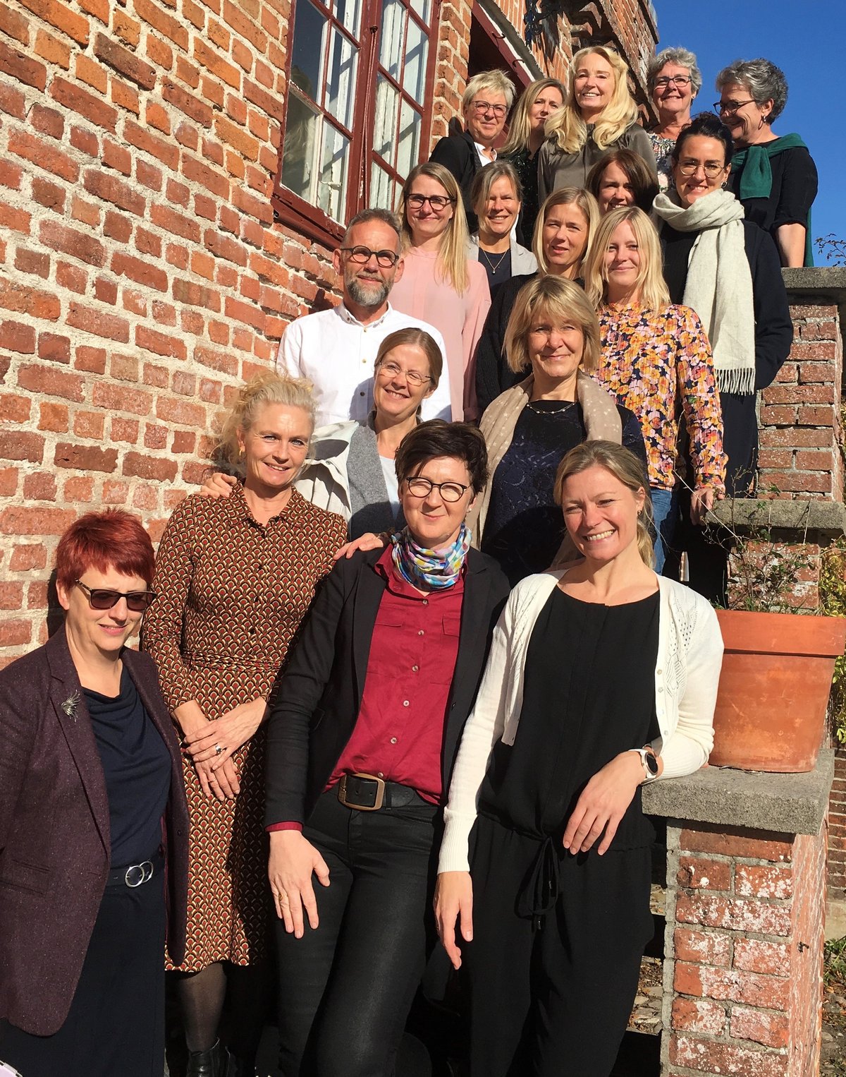 [Translate to Dansk:] Group photo of staff